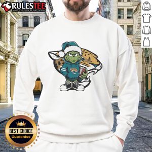 Awesome Grinch Hug Ball Jacksonville Jaguars Christmas sweatshirt featuring a festive design perfect for holiday cheer.