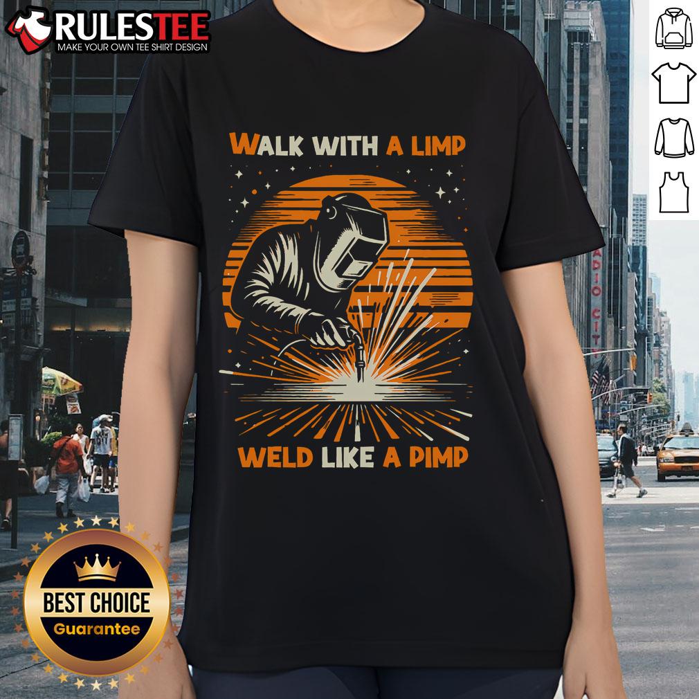 Vintage sunset graphic tee featuring 'Awesome Walk With A Limp Weld Like A Pimp' design for stylish ladies.
