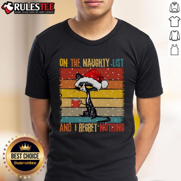 Cute cat wearing a Naughty and I Regret Nothing Christmas T-shirt, perfect for festive feline lovers and holiday fun.