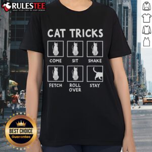 Funny cat owner performing tricks with a playful kitten, perfect tee for feline kitten lover ladies.