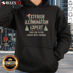 Good exterior illumination expert wearing a hoodie, showcasing effective lighting in outdoor spaces with small decorative lights.