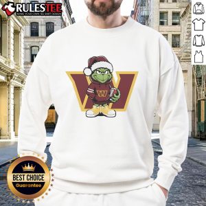 Cozy Good Grinch Hug sweatshirt featuring Washington Commanders logo, perfect for Christmas festivities.