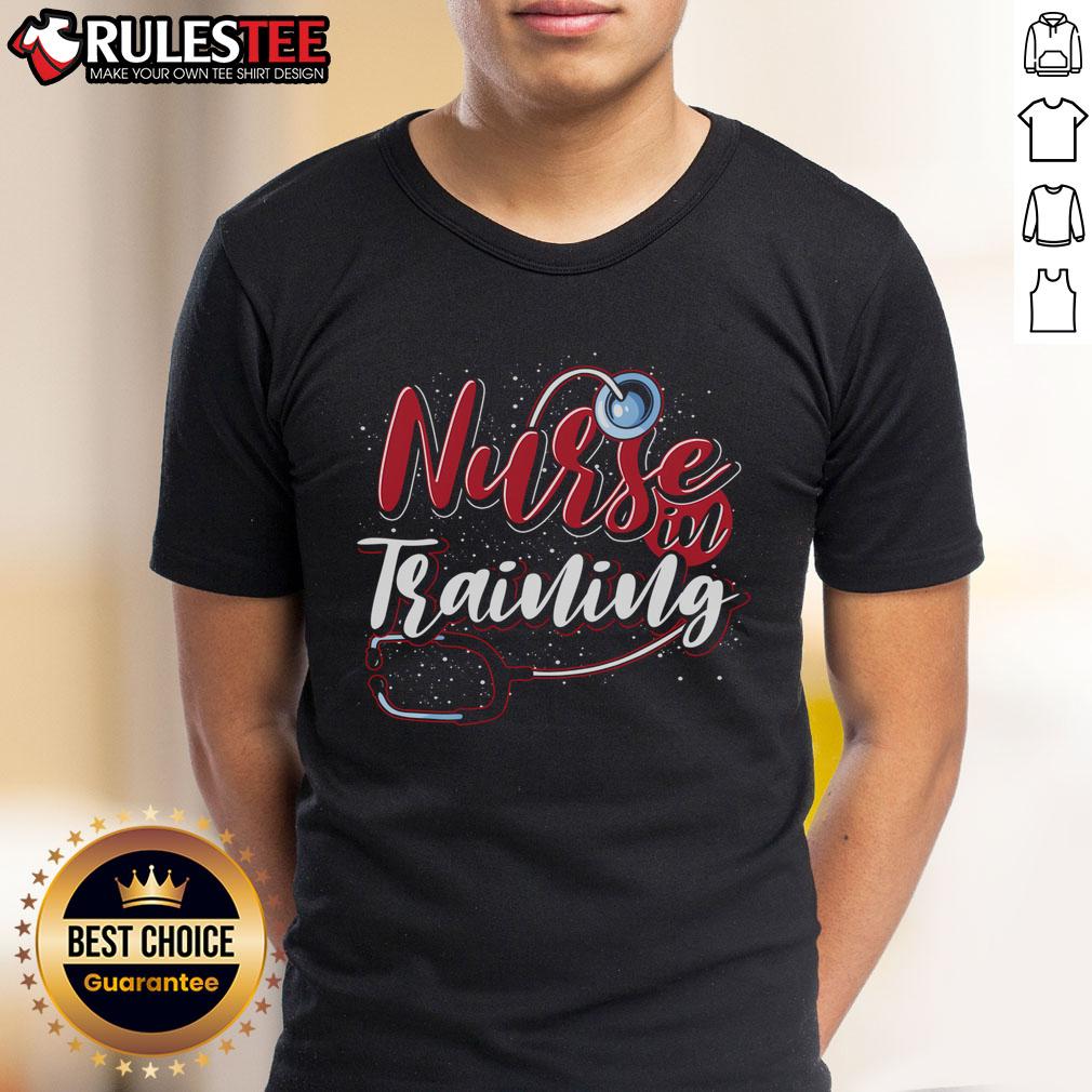 Future nurse wearing 'Good Nursing School Nurse In Training' T-shirt with stethoscope, representing nursing education and dedication.