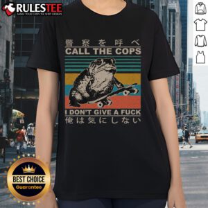 Vintage Japanese ladies tee featuring a skateboarding toad with the phrase 'Call The Cops, I Don't Give A Fck' in bold design.