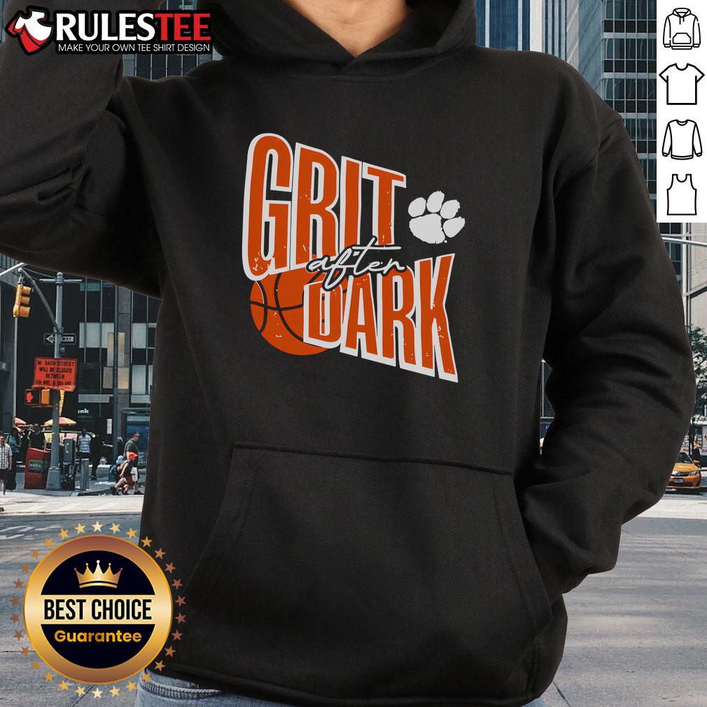 Awesome Grit After Dark Hoodie displayed on a mannequin, showcasing its stylish design and cozy fabric in a dimly lit setting.