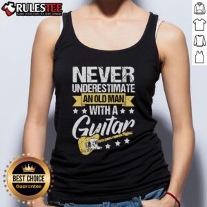 Old man wearing a guitar tank top, showcasing his passion for music and life, embodying the spirit of 'Never underestimate'.