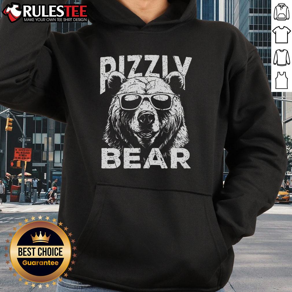 Awesome Rizzly Bear wearing sunglasses and a Rizz hoodie, showcasing a cool and playful vibe in a vibrant setting.