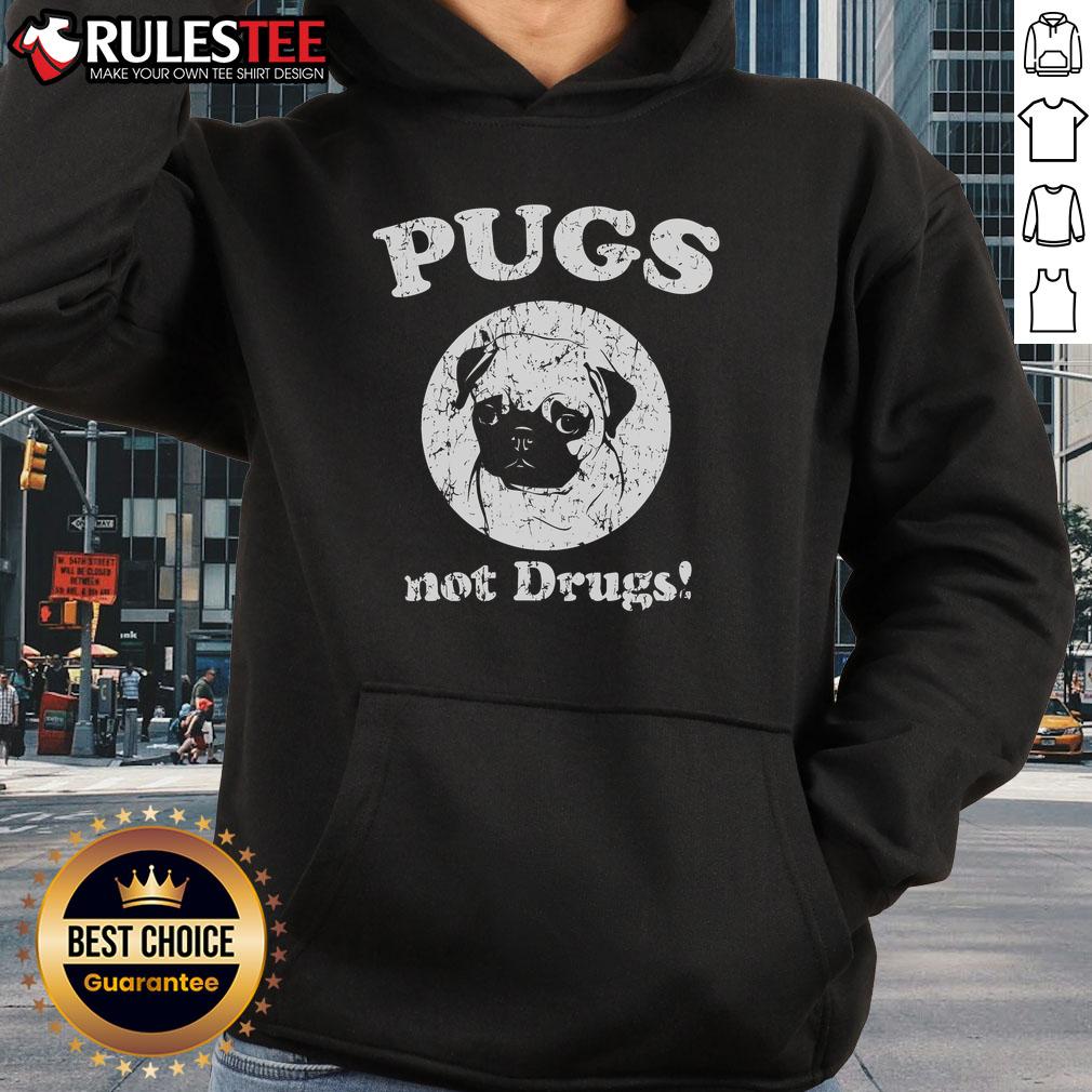 Adorable pug wearing a 'Cute Pugs Not Drugs' hoodie, perfect for dog lovers and trendy pet apparel.