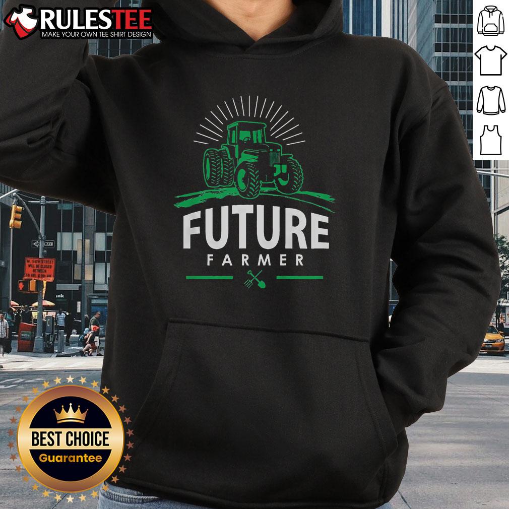 Awesome Future Farmer wearing a Rural Tractor Hoodie, showcasing a passion for agriculture in a vibrant countryside setting.