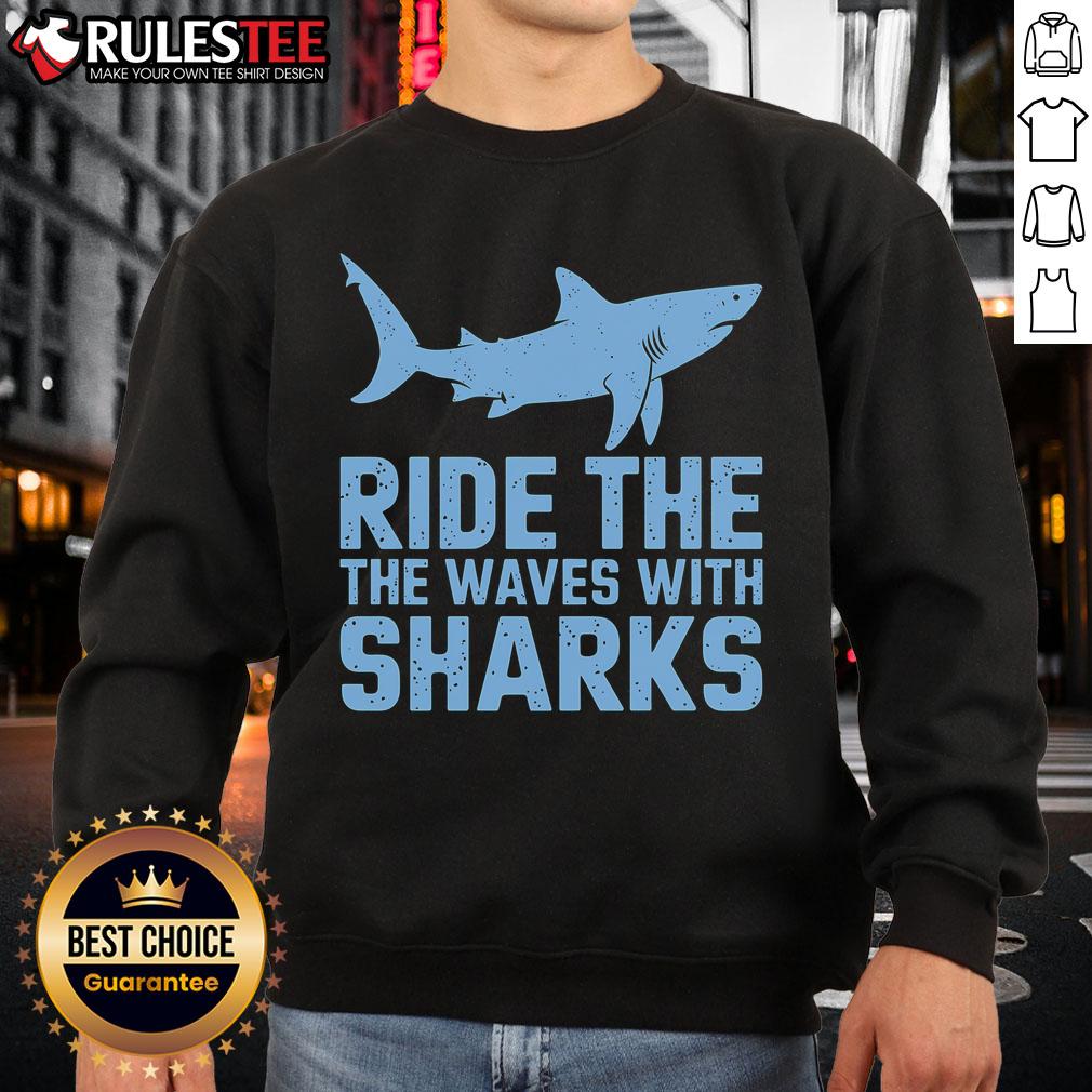 Alt Text: Awesome Ride the Waves with the Sharks sweatshirt featuring a vibrant ocean design and playful shark graphics.