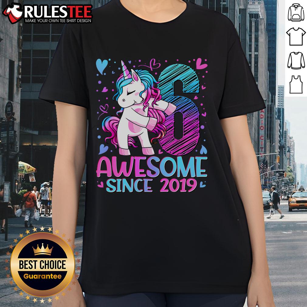 Adorable 6-year-old wearing a 'Awesome Since 2019' unicorn tee, perfect for kids who love fun and magical designs.