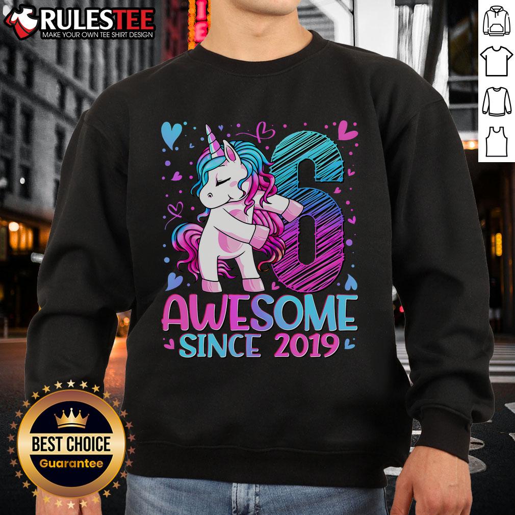 Alt Text: Cute 6-year-old wearing a 'Awesome Since 2019' unicorn sweatshirt, showcasing a playful and vibrant style.