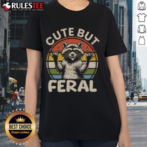 Adorable cute but feral raccoon graphic on vintage retro sunset ladies tee, perfect for casual and nature lovers.