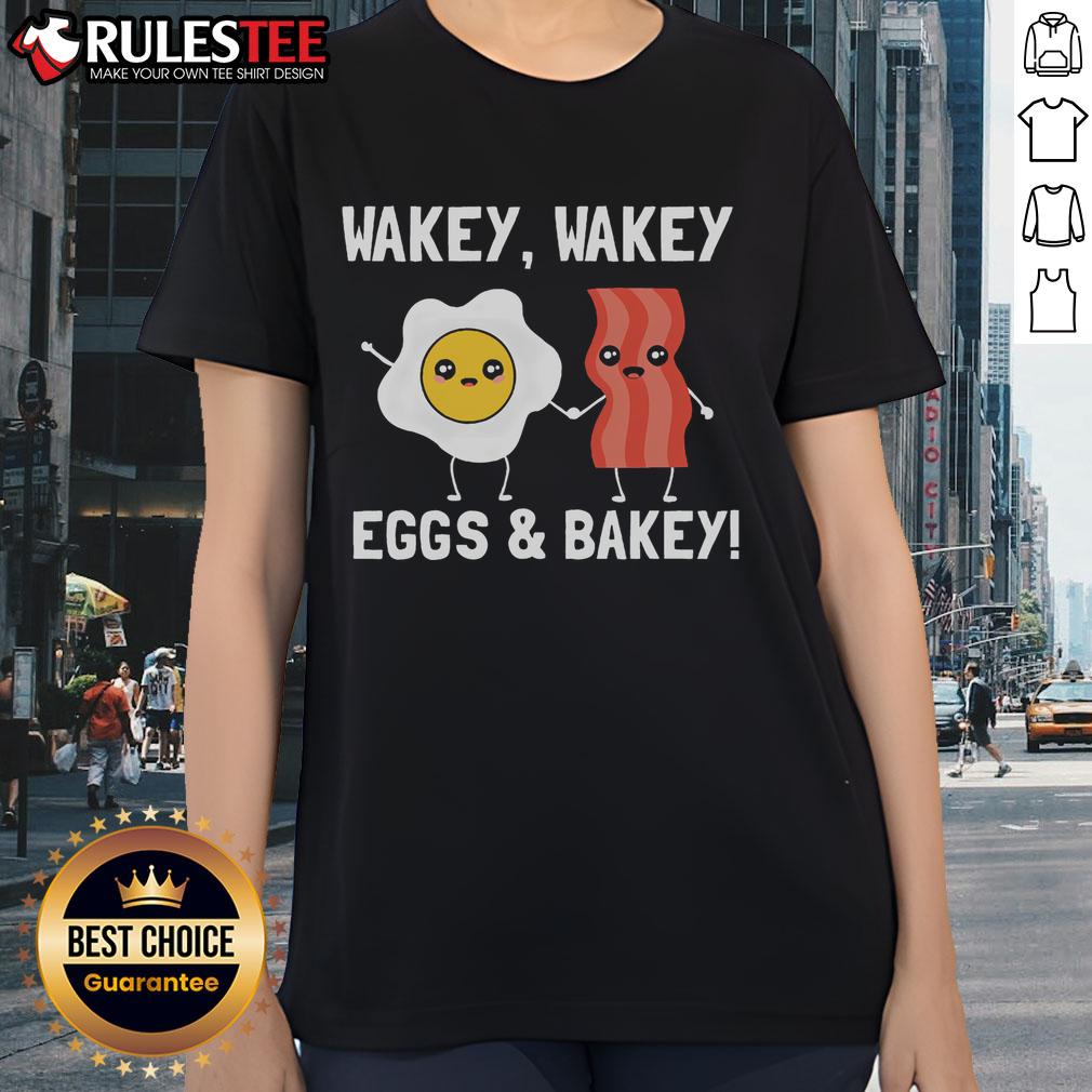Cute Wakey Wakey Eggs and Bakey bacon breakfast ladies tee featuring fun graphics and vibrant colors.