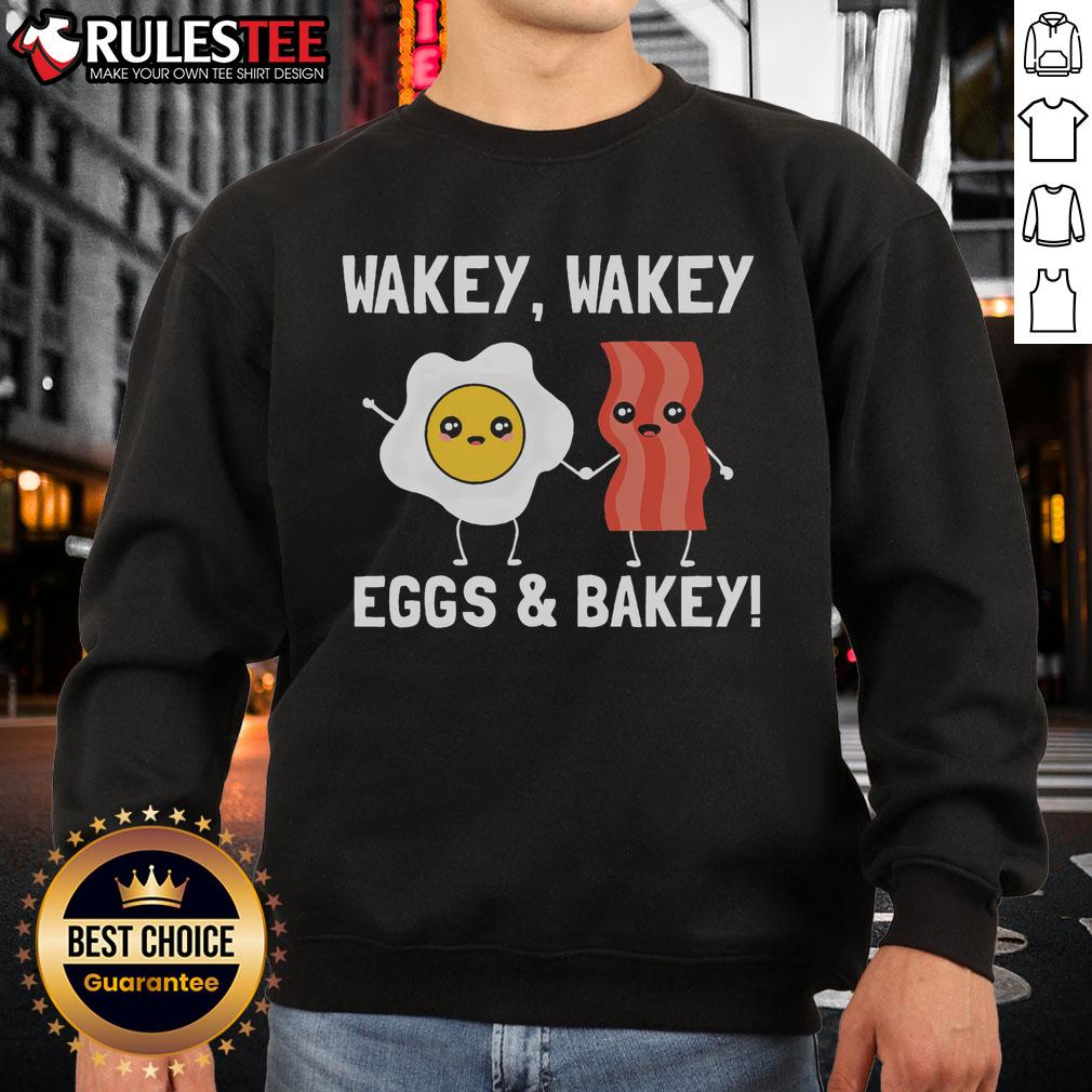 Cute Wakey Wakey Eggs and Bakey sweatshirt featuring playful bacon and egg design, perfect for breakfast lovers.