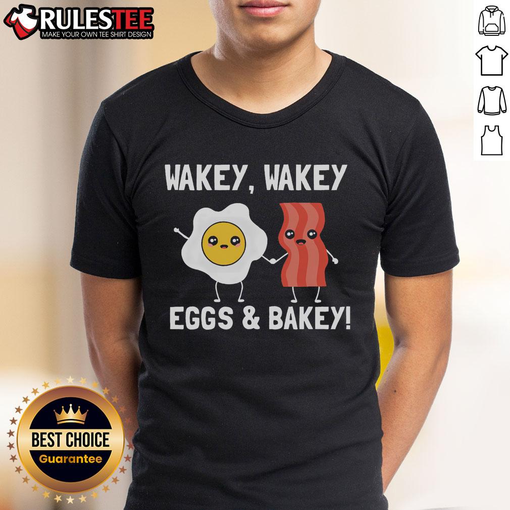 Adorable 'Wakey Wakey Eggs And Bakey' breakfast T-shirt featuring playful graphics of eggs and bacon for food lovers.