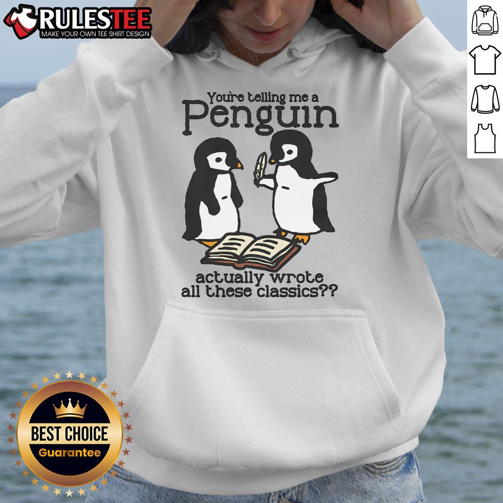 Adorable hoodie featuring a penguin with a literary theme, captioned 'Cute, You're Telling Me a Penguin Wrote Classics.'