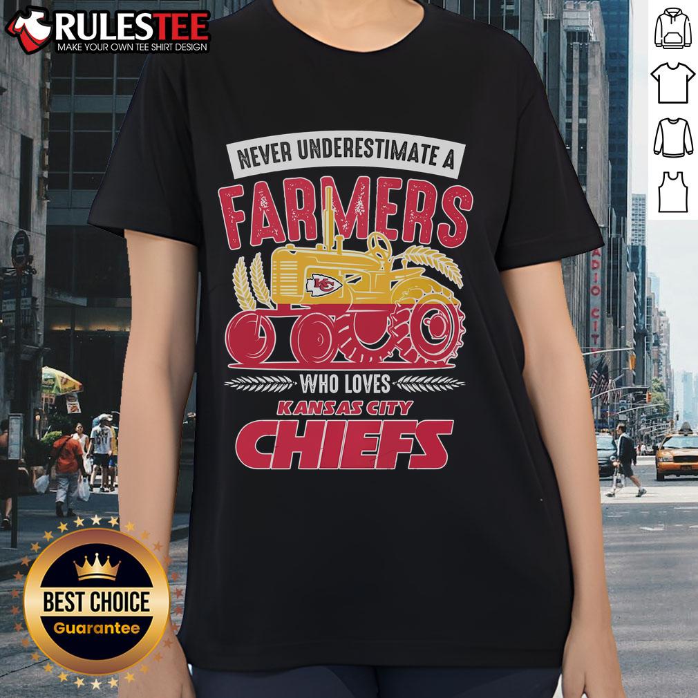 Awesome Never Underestimate A Farmer's Kansas City Chiefs Ladies Tee featuring a vibrant design and comfortable fit.