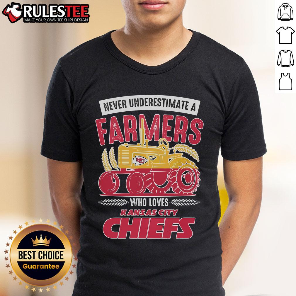 Awesome 'Never Underestimate A Farmer' Kansas City Chiefs T-Shirt featuring a bold design for passionate fans.