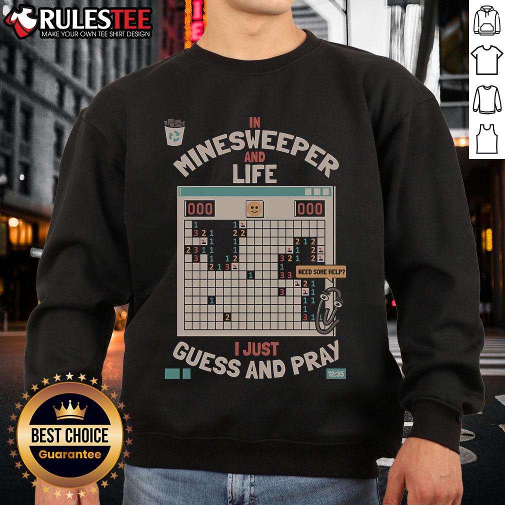 Retro sweatshirt featuring 'I Just Guess and Pray' Minesweeper philosophy graphic for gaming and life enthusiasts.
