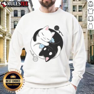 Cute balance kittens in a yin yang design on a cozy sweatshirt, perfect for cat lovers and unique fashion.