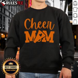 Funny Cheer Mom in an orange cheerleading sweatshirt, showcasing team spirit and humor at a school event.