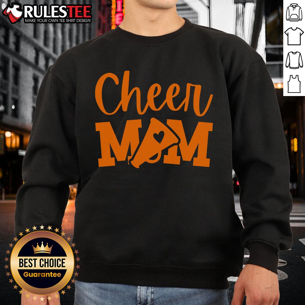 Funny Cheer Mom in an orange cheerleading sweatshirt, showcasing team spirit and humor at a school event.