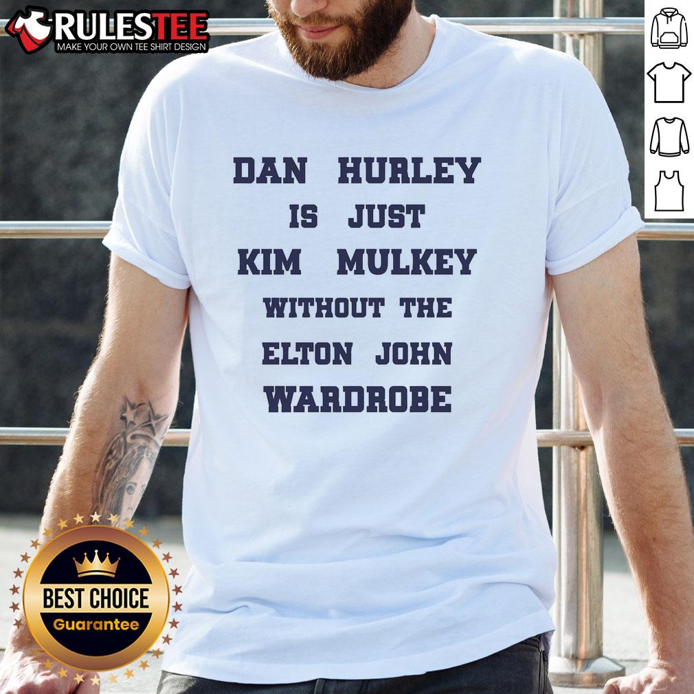 Good Dan Hurley in a casual look, compared to Kim Mulkey's style, wearing an Elton John wardrobe T-shirt.