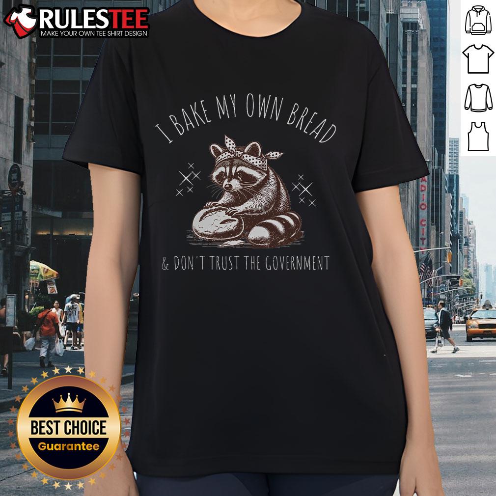 Raccoon ladies tee featuring the phrase 'I Bake My Own Bread And Don't Trust The Government' for funny, unique style.