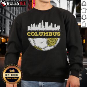 Columbus skyline with a soccer lover wearing an Awesome Columbus Soccer Lover sweatshirt, showcasing city pride.
