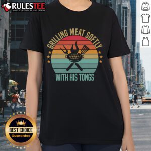 Vintage barbecue tee featuring a person grilling meat softly with tongs, perfect for grill enthusiasts and BBQ lovers.