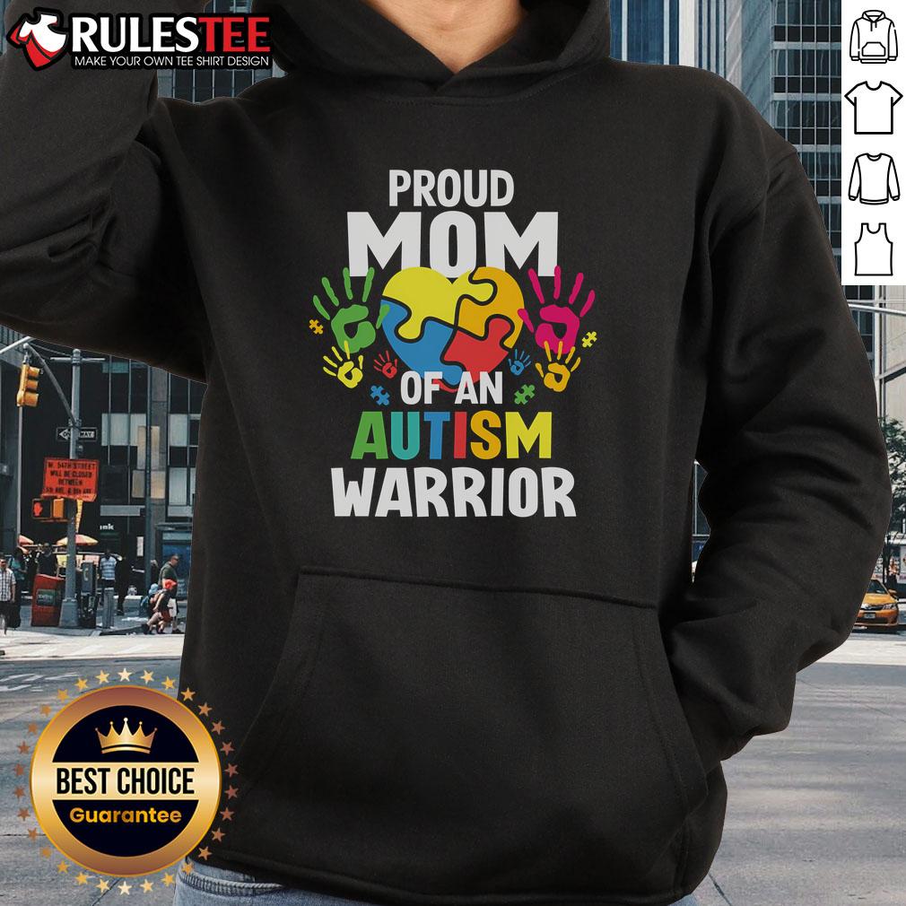 Alt Text: Proud mom wearing an Autism Warrior hoodie, showcasing love for her autistic son or daughter with a vibrant ribbon design.