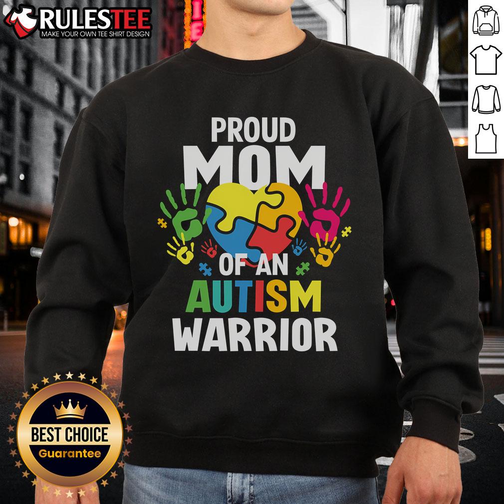 Awesome proud mom wearing sweatshirt for autism warrior son or daughter, featuring a colorful autism ribbon design.