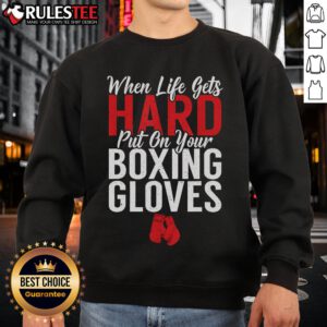 Alt Text: Fighting boxer wearing 'Awesome When Life Gets Hard' sweatshirt, showcasing determination and strength.