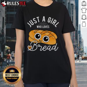 Alt Text: Cute girl wearing 'Just a Girl Who Loves Bread' tee, showcasing her passion for baking with a breadmaker in the kitchen.