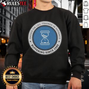 Official Raised On Lag sweatshirt, featuring 'Trained in Patience, Buffering Since 1985' design, perfect for lag enthusiasts.