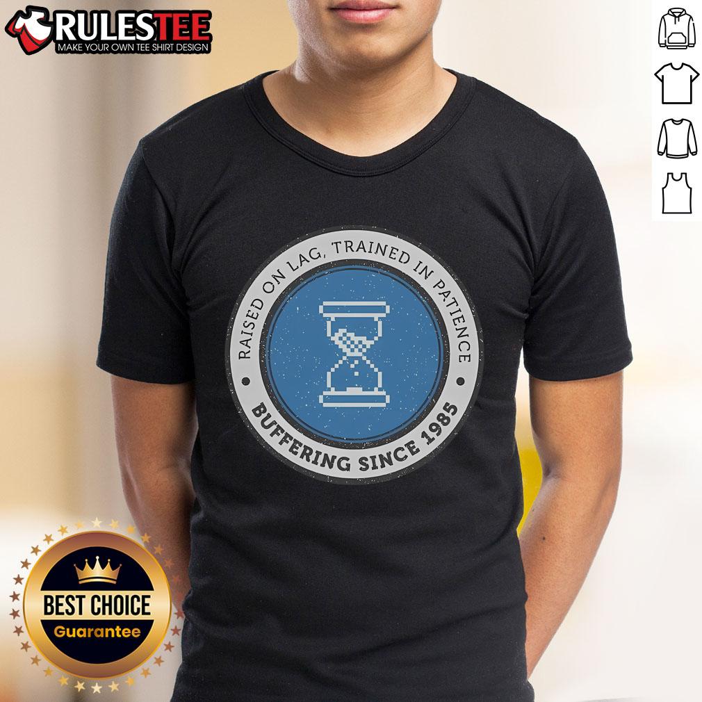 Official Raised On Lag T-Shirt featuring 'Trained In Patience Buffering Since 1985' design for gamers and tech lovers.