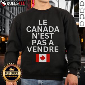 Alt Text: Top Canada is Not for Sale sweatshirt in French, Le Canada N'est Pas Vendre, showcasing bold text design.