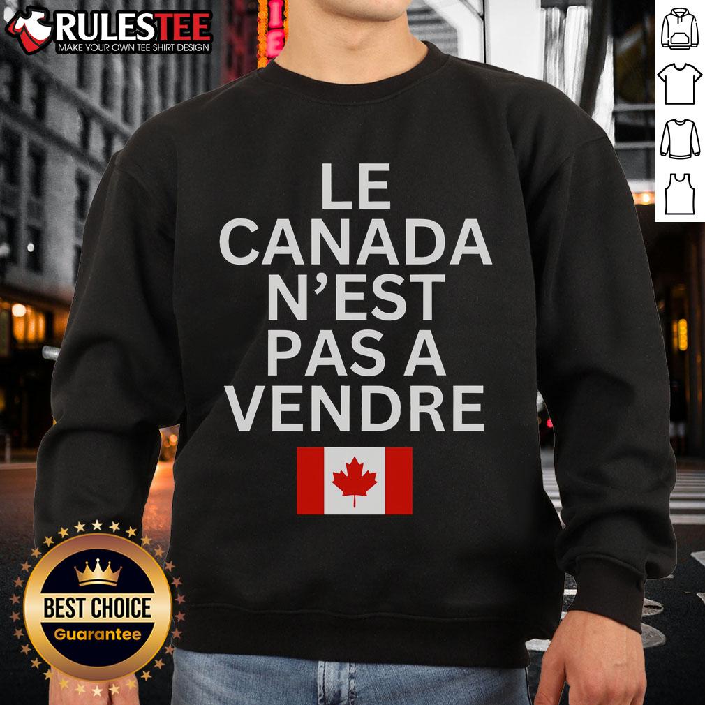 Alt Text: Top Canada is Not for Sale sweatshirt in French, Le Canada N'est Pas Vendre, showcasing bold text design.