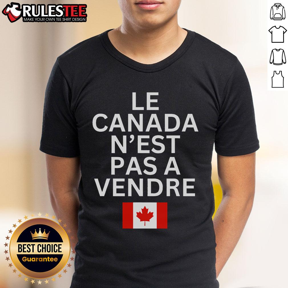 Top Canada Is Not For Sale T-Shirt in French 'Le Canada N'Est Pas A Vendre' showcasing Canadian pride and identity.