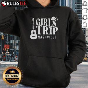 Group of friends in Nashville wearing 'Bachelorette' cowboy hoodies for a fun 2025 girl trip celebration.