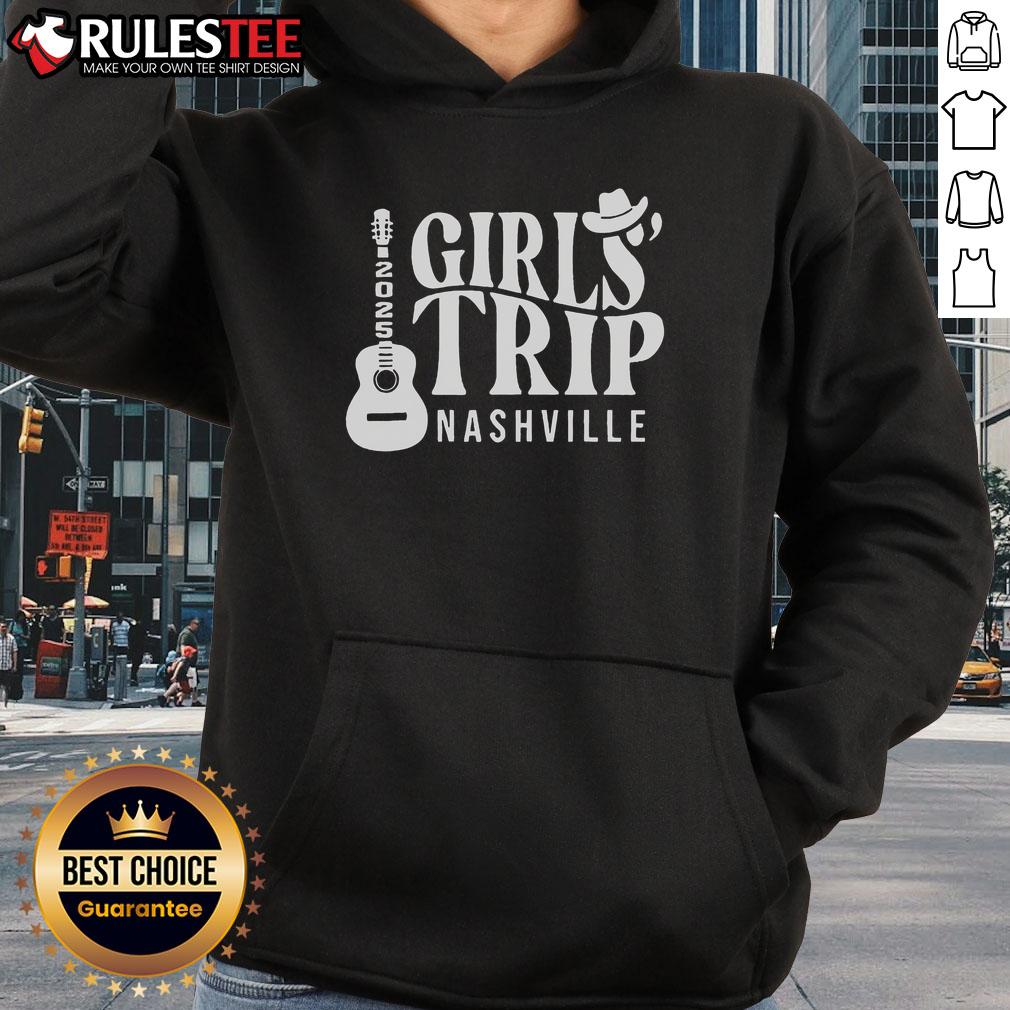 Group of friends in Nashville wearing 'Bachelorette' cowboy hoodies for a fun 2025 girl trip celebration.