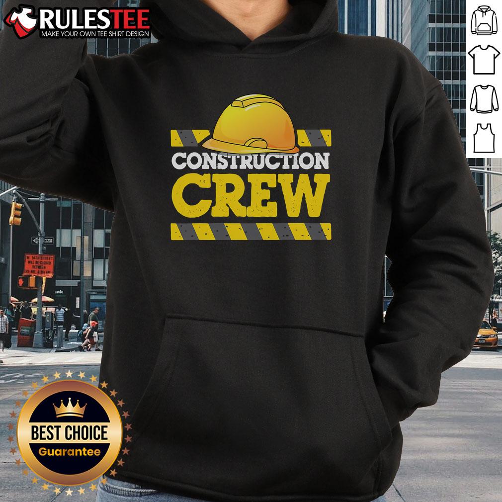 Awesome construction crew wearing construction hats and hoodies at a job site, showcasing teamwork and safety.