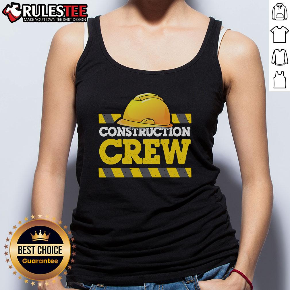 Awesome construction crew wearing hats and tank tops at a job site, showcasing teamwork and dedication in construction work.