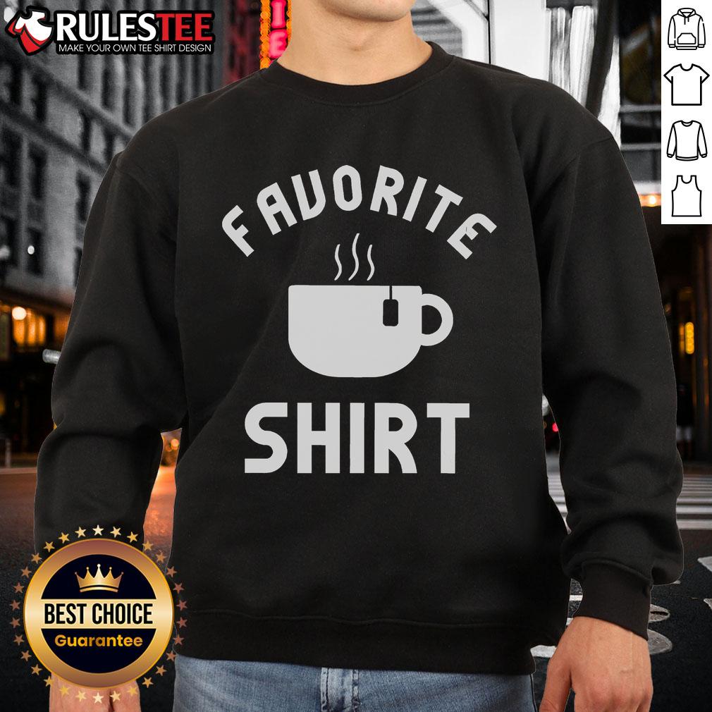 Cozy Awesome My Favorite Tea sweatshirt displayed on a wooden background, perfect for tea lovers and casual wear.