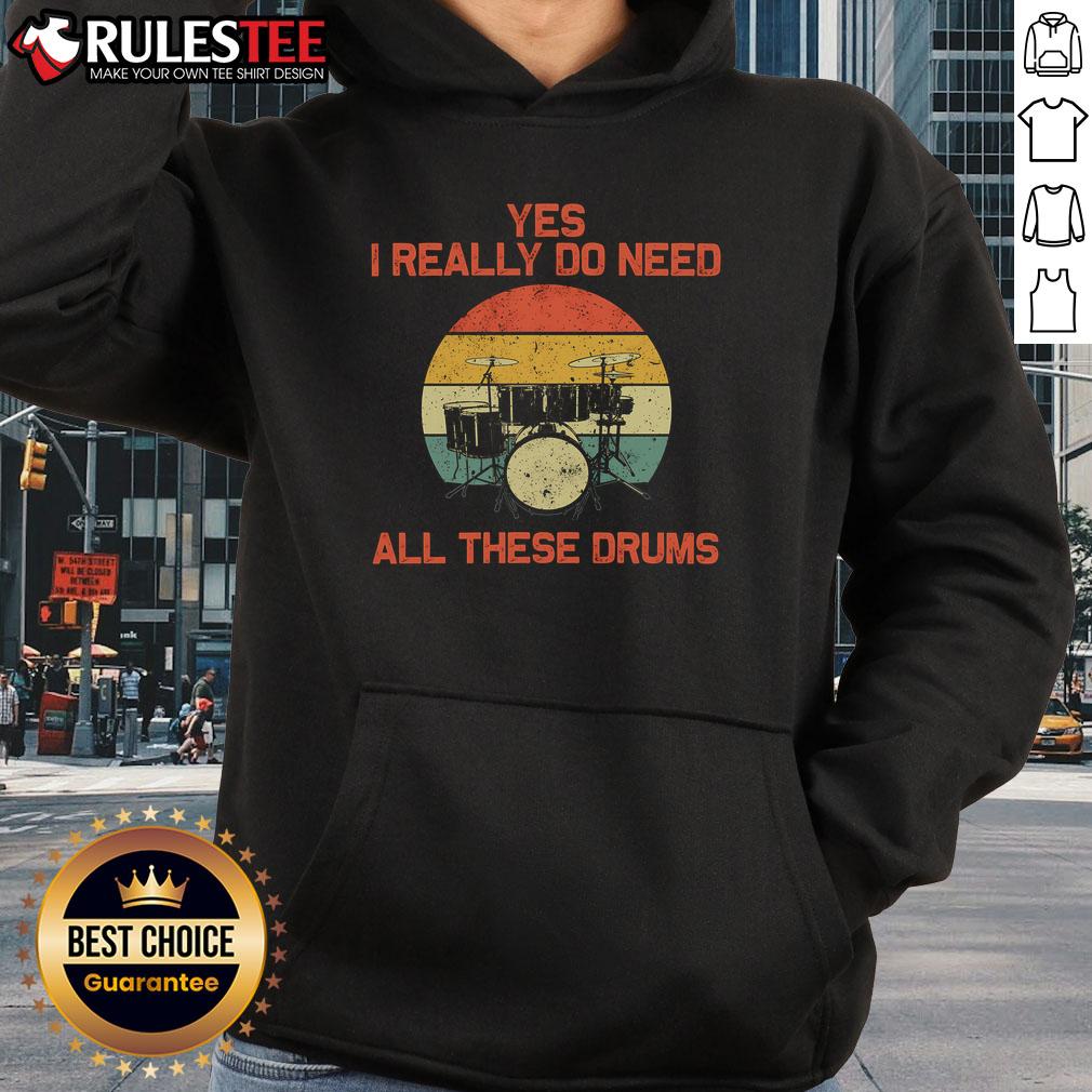 Alt Text: Drummer wearing 'Awesome Yes I Really Do Need All These Drums' hoodie, showcasing passion for drumming.