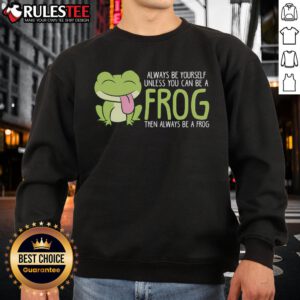 Alt Text: Cute frog sweatshirt with the phrase Always be yourself unless you can be a frog in playful font.