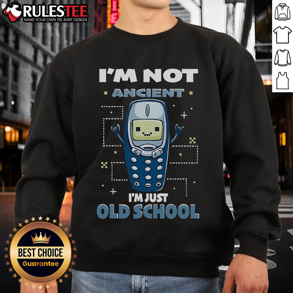 Cute 'I'm Not Ancient, I'm Just Old School' sweatshirt in a stylish design, perfect for vintage fashion lovers.