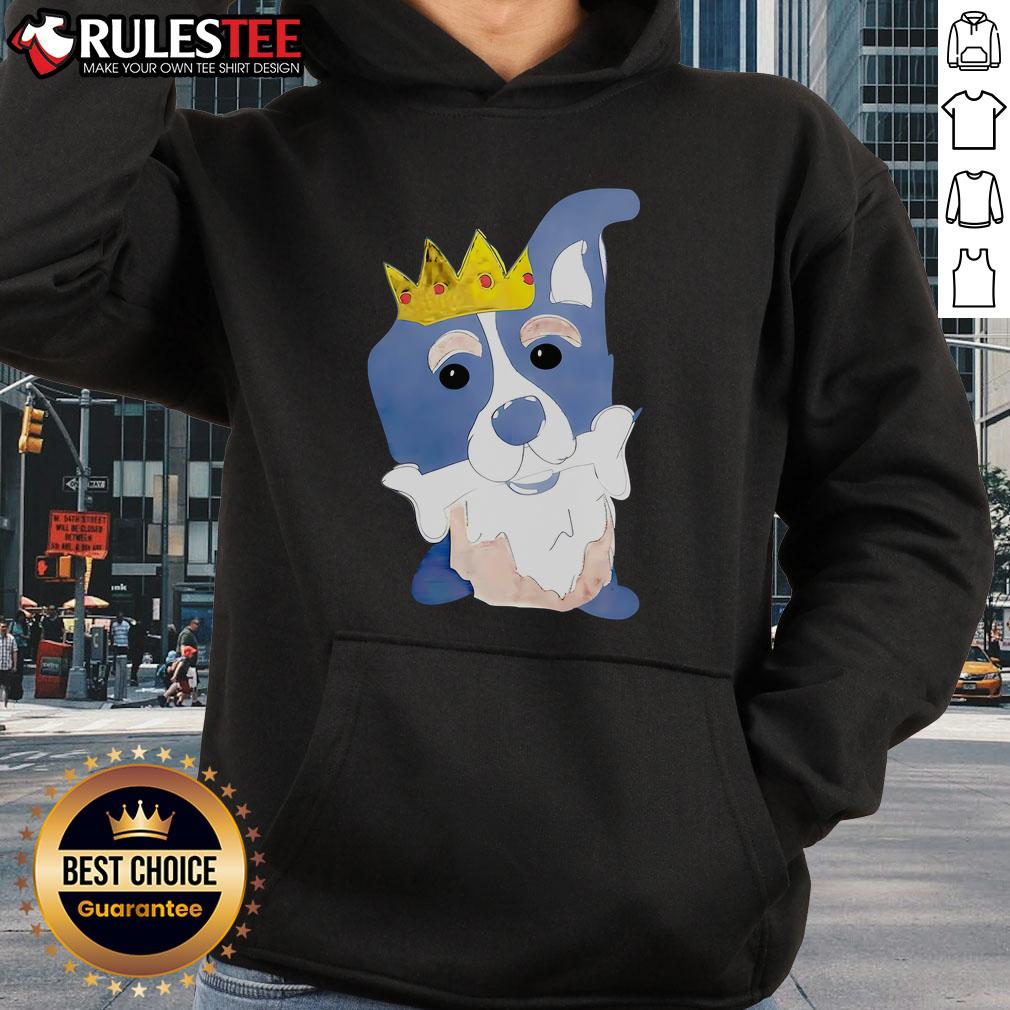 Alt Text: Cute king dog in a cartoon hoodie happily chewing on bones, showcasing playful and royal pet fashion.