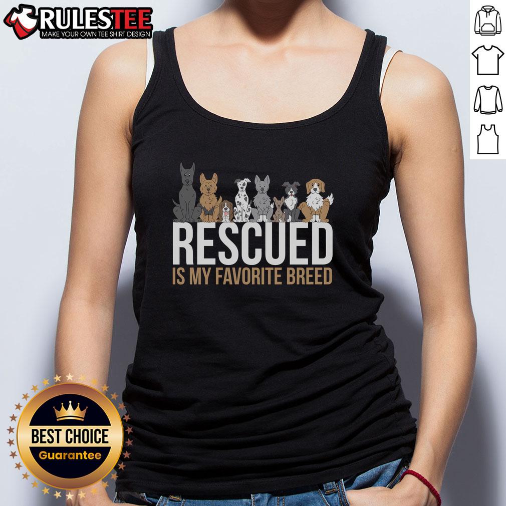 Alt Text: Cute rescued dog wearing a tank top with 'Rescued is my favorite breed' design, showcasing pet fashion.